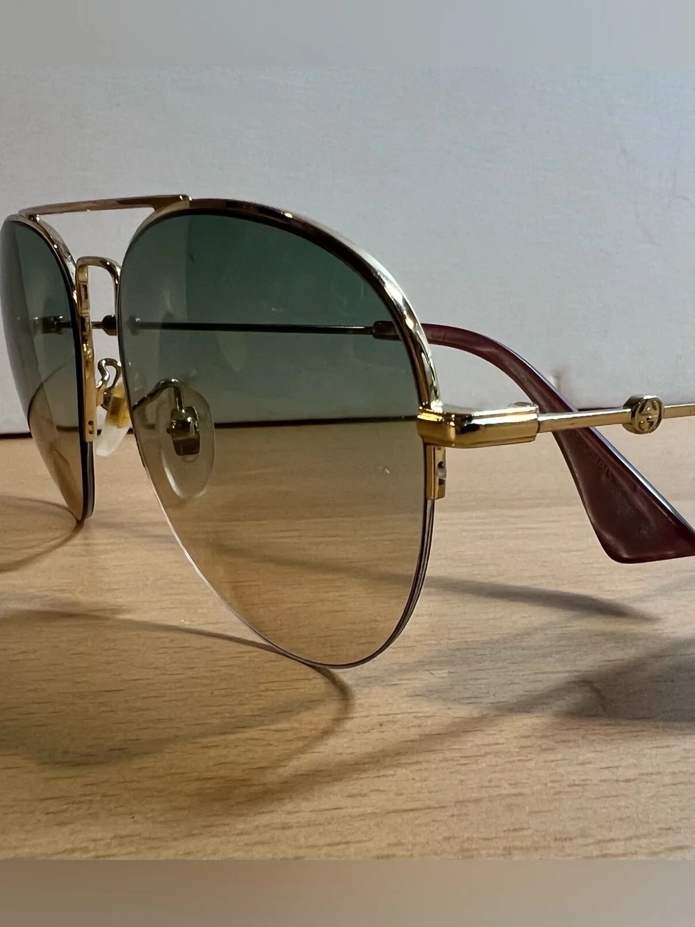 Gucci Men’s Gold Frame Sunglasses with Green Lenses $150